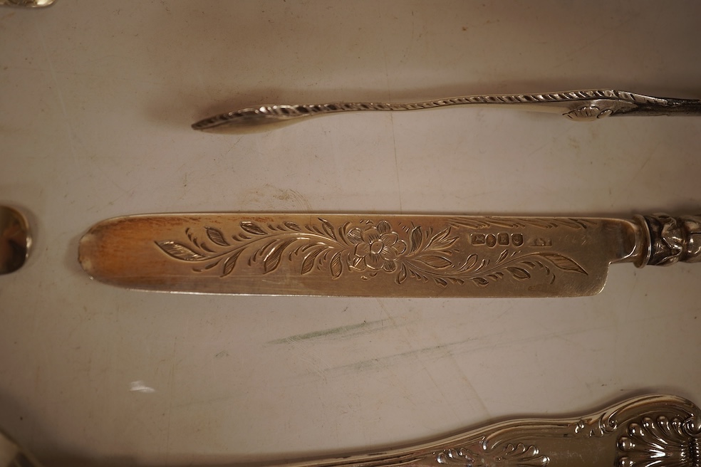 A small quantity of assorted mainly 19th century and later small flatware including teaspoons, coffee spoons and condiment spoons, various dates and makers, a Dutch? white metal spoon and a Victorian silver christening t